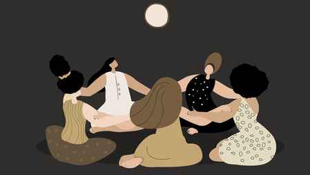 Women in a circle supporting each other