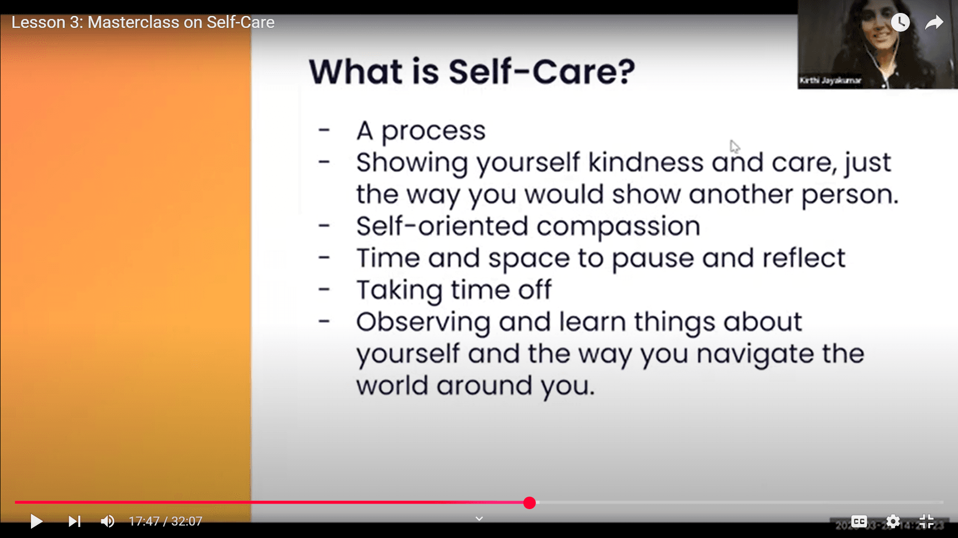 The World Pulse community head is presenting a slide on self-care during a session.