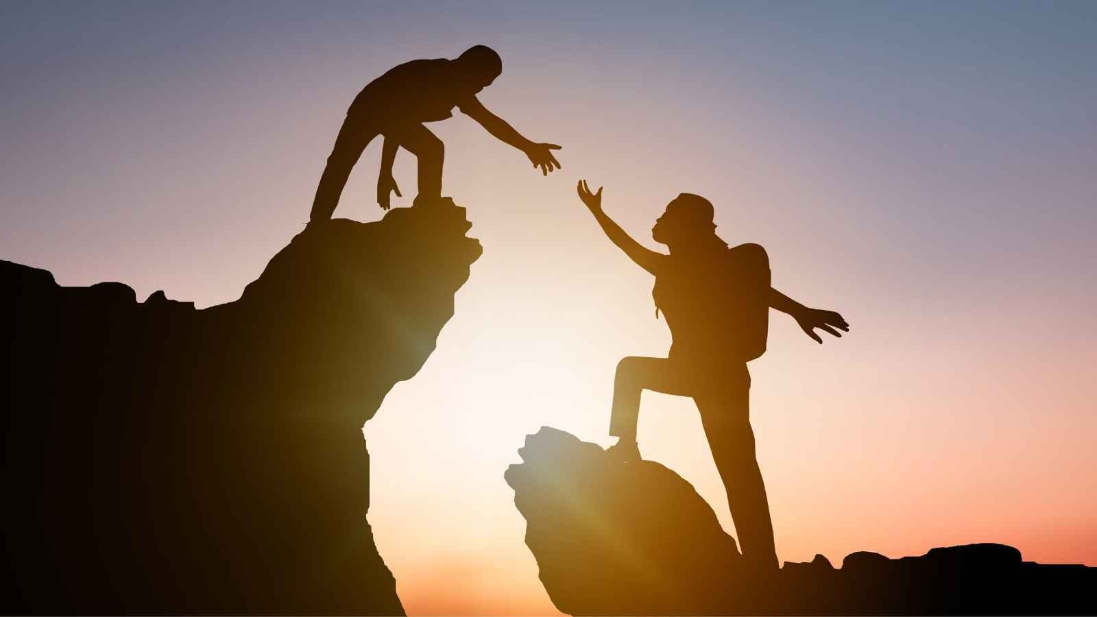 Two People Climbing