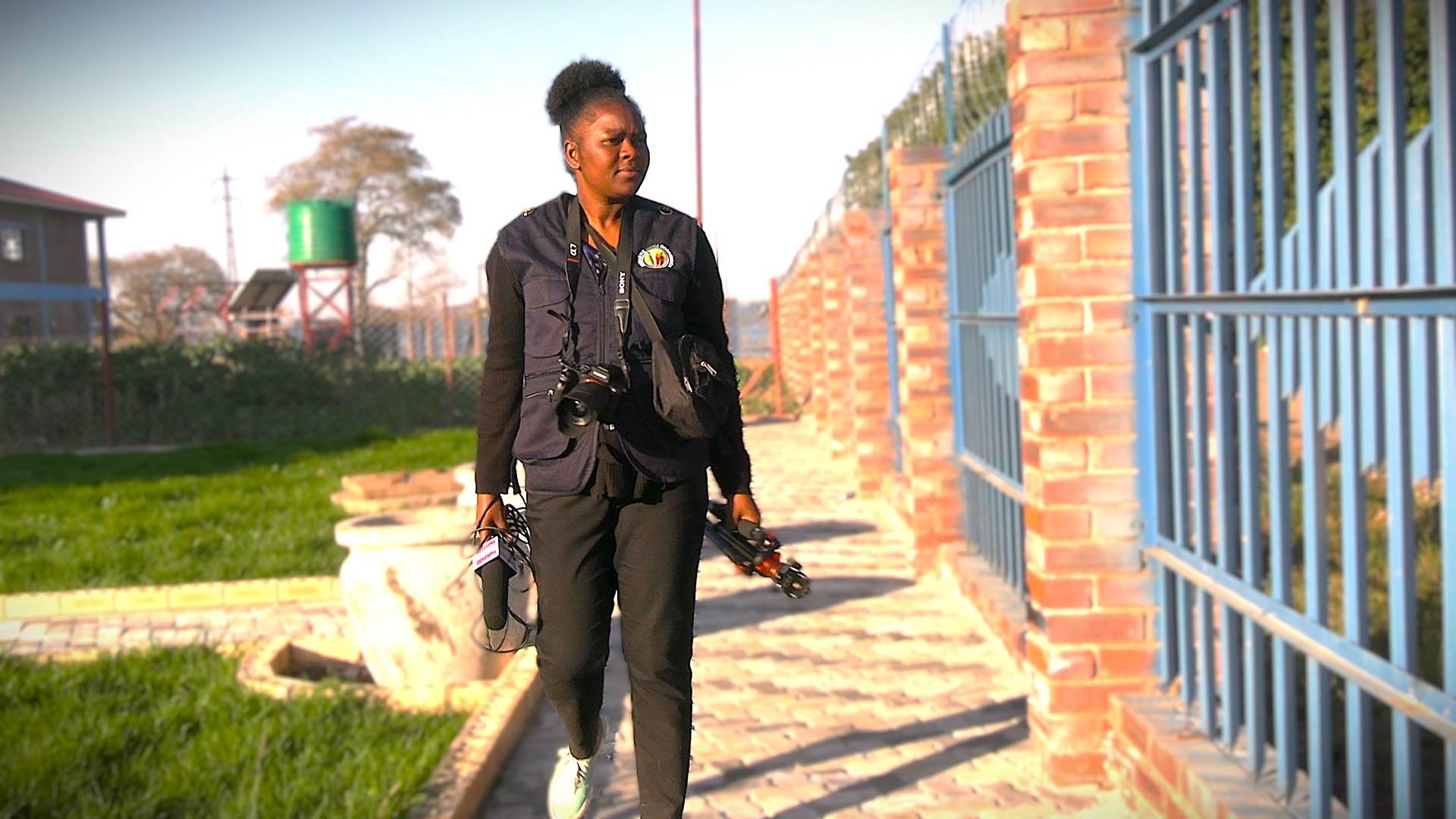 A photo of Theresa Takafuma, working as a journalist in Masvingo Province, Zimbabwe